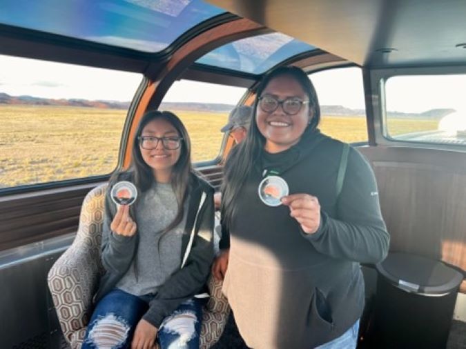Crystal and Kayla, members of the Northern New Mexico Big Brothers Big Sisters organization, ride the BNSF train.