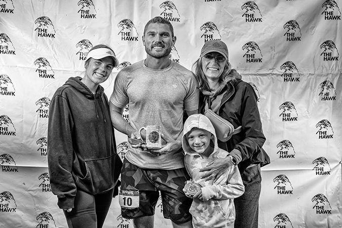 With family and first-place finisher award and buckle. Photo by Rick Mayo/Mile 90 Photography