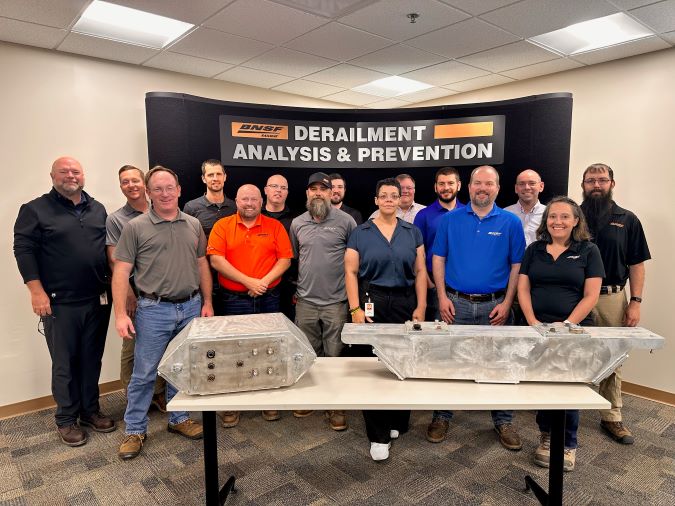 The BNSF team that contributed to ODIN’s in-house design. The model on the left is the final version.   