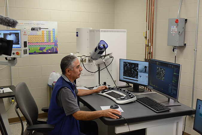 Senior Engineer I Huseyin Guzel performs chemical analysis of residue found in traction motors using a Scanning Electron Microscope (SEM)/Energy Dispersive Spectroscopy (EDS).