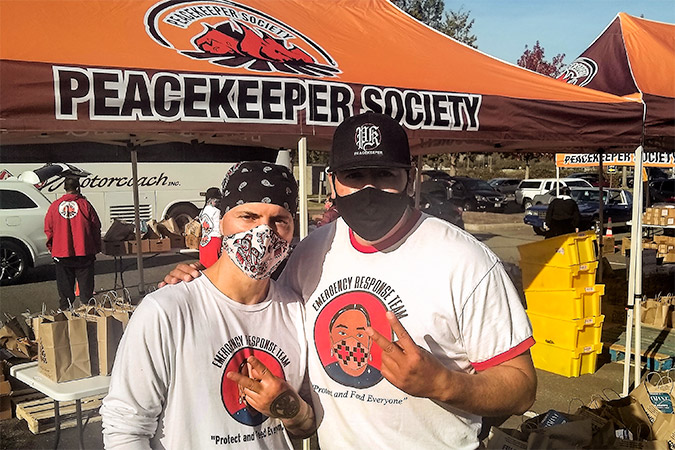 BNSF Tribal Relations Director Quanah Spencer, right, with Xuxuxyay Raven, executive director of the Peacekeeper’s Society. 